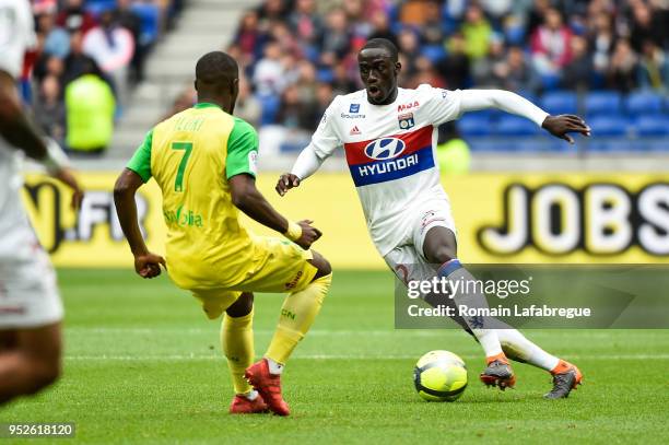 Ferland Mendy of Lyon and Jules Iloki of Nantes during the Ligue 1 match between Olympique Lyonnais and Nantes at Parc Olympique on April 28, 2018 in...