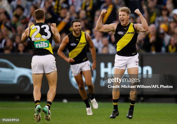 Josh Caddy of the Tigers celebrates a goal during the 2018 AFL round six match between the Collingwood Magpies and the Richmond Tigers at the...