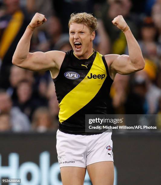 Josh Caddy of the Tigers celebrates a goal during the 2018 AFL round six match between the Collingwood Magpies and the Richmond Tigers at the...