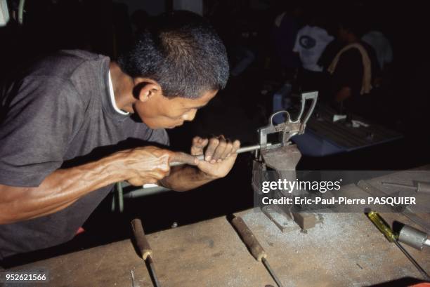 The Gun of Danao. "Making weapons is all we know how to do," say the inhabitants of Danao. In a workshop of DAMANCOR, the artisans file down and...