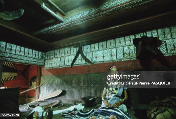 The Yami People Of Lanyu. Portrait of the elder of the village of Yeh Yin in her residence.