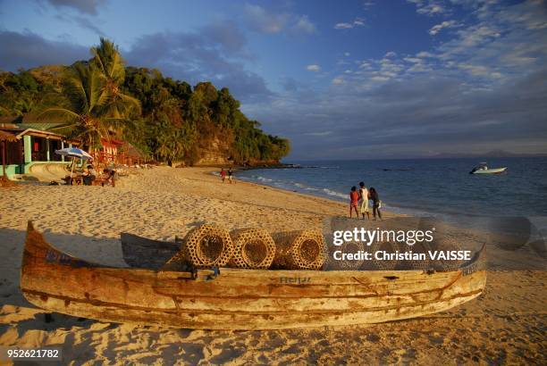 Ambatoloaka Beach And Dugout Canoe Nosy be Island.