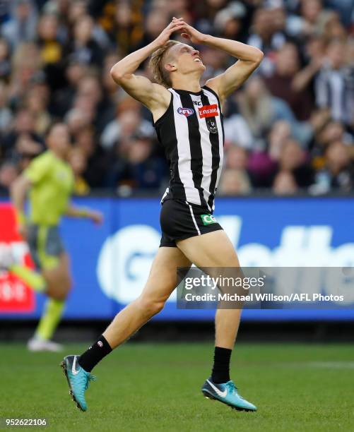 Jaidyn Stephenson of the Magpies rues a missed shot on goal during the 2018 AFL round six match between the Collingwood Magpies and the Richmond...