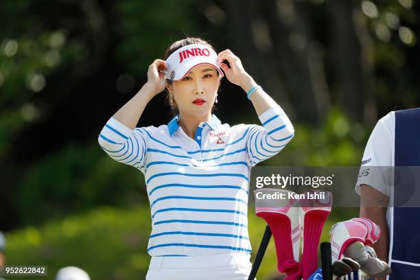 Ha-Neul Kim of Korea prepares to tee shot on the first hole during the final round of the CyberAgent Ladies Golf Tournament at Grand fields Country...