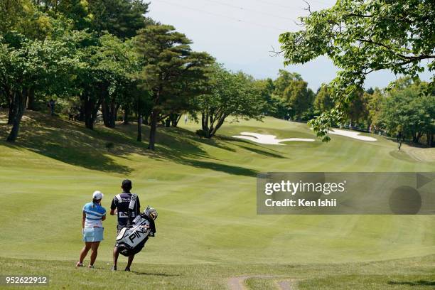 Ai Suzuki of Japan hits a second shot on the first hole during the final round of the CyberAgent Ladies Golf Tournament at Grand fields Country Club...