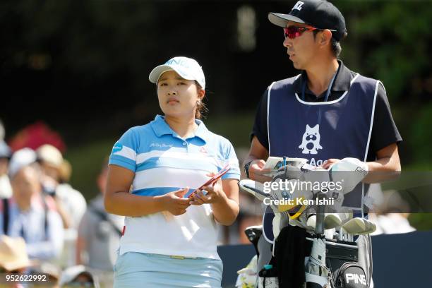 Ai Suzuki of Japan prepares to tee shot on the first hole during the final round of the CyberAgent Ladies Golf Tournament at Grand fields Country...