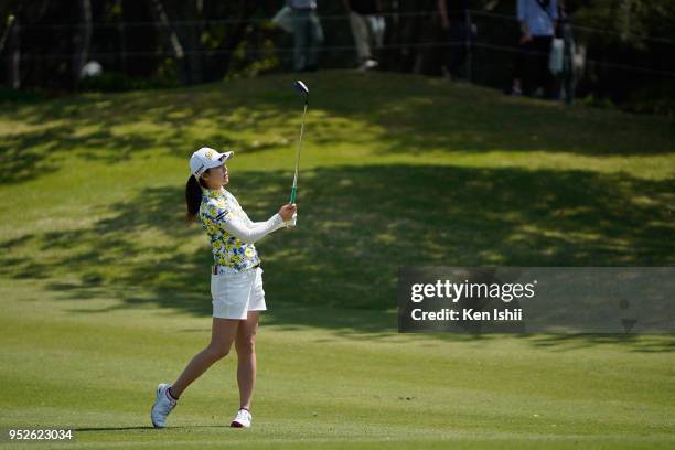 Hina Arakaki of Japan watches on the first hole during the final round of the CyberAgent Ladies Golf Tournament at Grand fields Country Club on April...