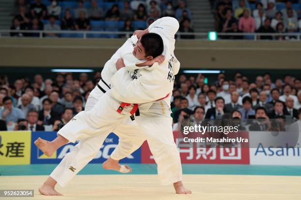 Takeshi Ojitani attempts to throw Hisayoshi Harasawa in the final during the All Japan Judo Championship at the Nippon Budokan on April 29, 2018 in...