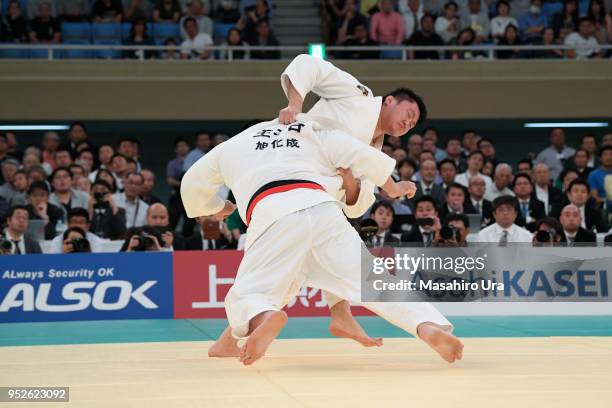 Hisayoshi Harasawa attempts to throw Takeshi Ojitani in the final during the All Japan Judo Championship at the Nippon Budokan on April 29, 2018 in...