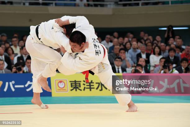 Takeshi Ojitani attempts to throw Hisayoshi Harasawa in the final during the All Japan Judo Championship at the Nippon Budokan on April 29, 2018 in...