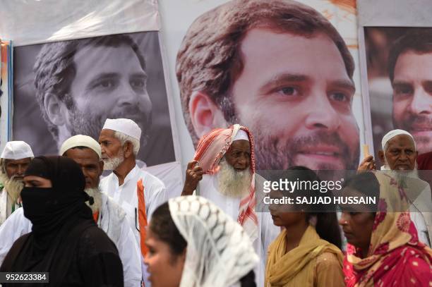 Supporters of President of the Indian National Congress Party Rahul Gandhi leaves after attending a rally dubbed Jan Aakrosh Rally in New Delhi on...
