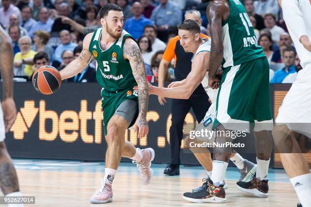 Mike James of Panathinaikos Superfood vies Jaycee Carroll, #20 of Real Madrid in action during the Turkish Airlines Euroleague Play Offs Game 4...