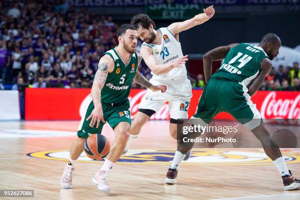 Mike James of Panathinaikos Superfood, Sergio Llull of Real Madrid and James Gist of Panathinaikos Superfood in action during the Turkish Airlines...