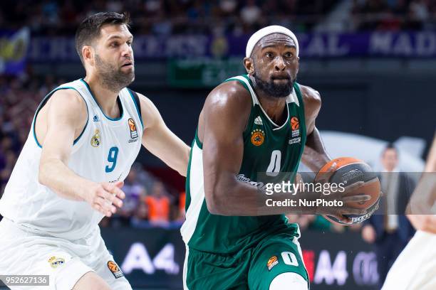 Felipe Reyes, #9 of Real Madrid vies Chris Singleton of Panathinaikos Superfood during the Turkish Airlines Euroleague Play Offs Game 4 between Real...
