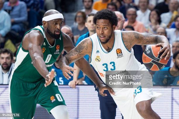 Chris Singleton, #0 of Panathinaikos Superfoods Athens vies Trey Thompkins of Real Madrid during the Turkish Airlines Euroleague Play Offs Game 4...