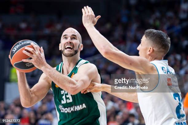 Nick Calathes, #33 of Panathinaikos Superfoods Athens vies Jaycee Carroll of Real Madrid in action during the Turkish Airlines Euroleague Play Offs...