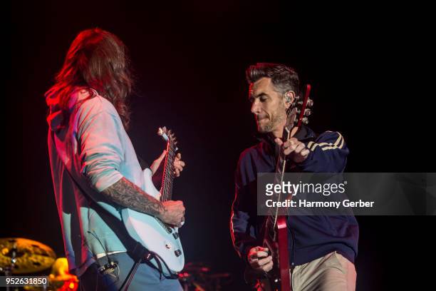 Nick Hexum and Timothy Mahoney of 311 perform at the Back to the Beach Festival at Huntington State Beach on April 28, 2018 in Huntington Beach,...