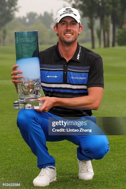 Alexander Bjork of Sweden holds the trophy as he celebrates winning the 2018 Volvo China Open at Topwin Golf and Country Club on April 29, 2018 in...