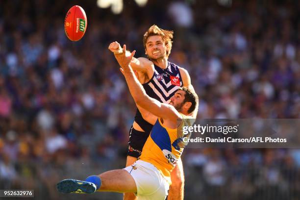 Joel Hamling of the Dockers spoils a mark from Jack Darling of the Eagles during the 2018 AFL round six match between the Fremantle Dockers and the...