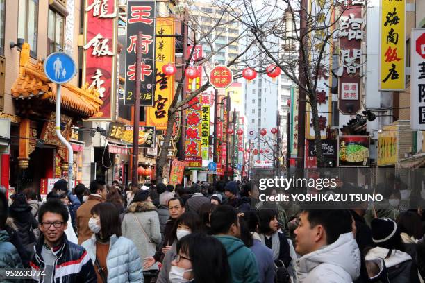 Yokohama Chinatown is crowded with people as Chinese Lunar New Year started in Yokohama, suburban Tokyo on January 29, 2017. People celebrate the...