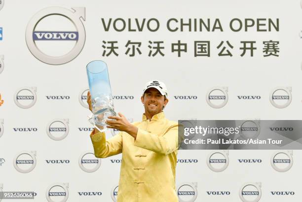 Alexander Bjrk of Sweden pictured withe the winner's trophy at the Topwin Golf and Country Club after the final round of the Volvo China Open on...