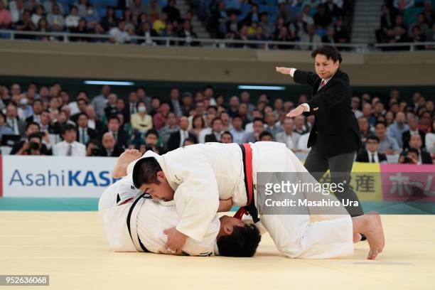 Takeshi Ojitani competes against Yusei Ogawa in the semi final during the All Japan Judo Championship at the Nippon Budokan on April 29, 2018 in...