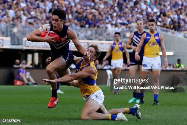 Adam Cerra of the Dockers tackles Brad Sheppard of the Eagles during the Round 6 AFL match between the Fremantle Dockers and West Coast Eagles at...