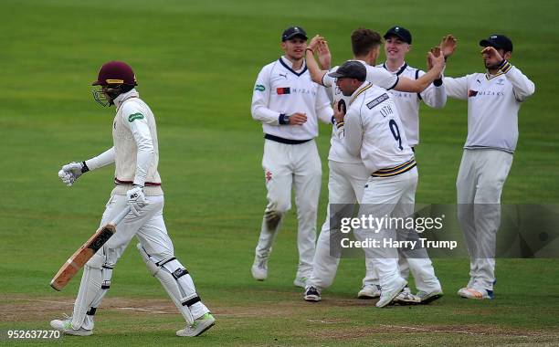 George Bartlett of Somerset walks off after being dismissed by Ben Coad of Yorkshire during day three of the Specsavers County Championship Division...