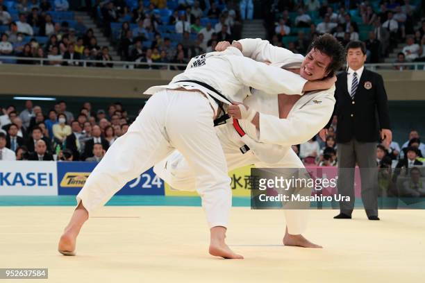 Ryu Shichinohe attempts to throw Hisayoshi Harasawa in the Fourth round during the All Japan Judo Championship at the Nippon Budokan on April 29,...