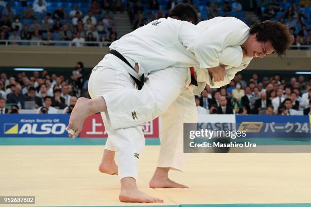 Ryu Shichinohe attempts to throw Hisayoshi Harasawa in the Fourth round during the All Japan Judo Championship at the Nippon Budokan on April 29,...