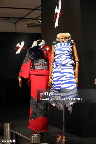 Kimono dresses designed by Yoshiki, a member of Japanese rock group "X Japan" are displayed at an opening event to promote "Yoshikimono" at the...