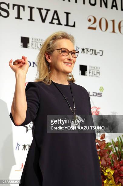 American actress Meryl Streep poses for photos during a press conference for her latest movie "Florence Foster Jenkins" in Tokyo on October 24, 2016.
