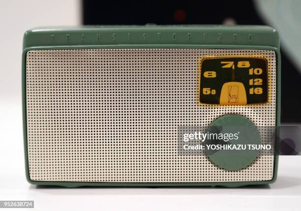 Japan's electronics giant Sony displays the transistor radio receiver "TR-55" produced in 1955 at the company's retrospective exhibition "It's a Sony...