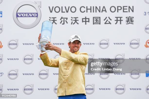 Alexander Bjork of Sweden holds the trophy celebrates after winning the 2018 Volvo China Open at Topwin Golf and Country Club on April 29, 2018 in...