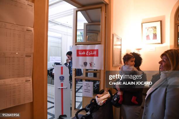 People queue to vote for the Lebanon's parliamentary election on April 29 at the Lebanon consulate in Paris. - The Middle Eastern country has not...