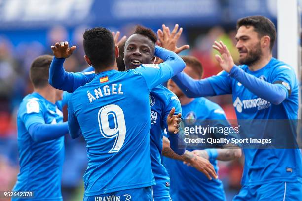Amath Ndiaye of Getafe celebrates after scoring his team's first goal with his teammates during the La Liga match between Getafe and Girona at...