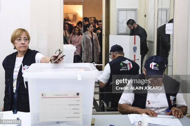 People queue to vote for the Lebanon's parliamentary election on April 29 at the Lebanon consulate in Paris. - The Middle Eastern country has not...