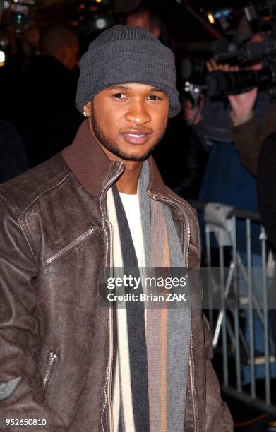 Usher arrives to the premiere of "Fade To Black" held at the Ziegfeld Theater, New York City.