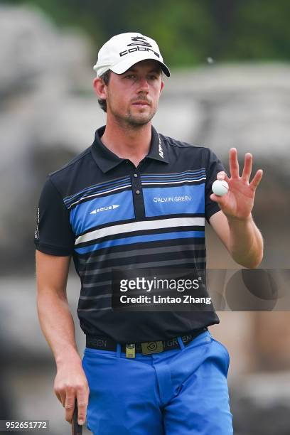 Alexander Bjork of Sweden waves his ball to the fans during the final round of the 2018 Volvo China Open at Topwin Golf and Country Club on April 29,...