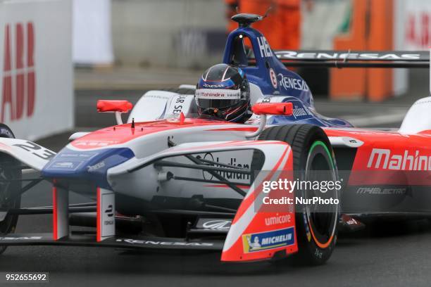 Germanys Nick Heidfeld of the Formula E team Mahindra competes during the French stage of the Formula E championship around The Invalides Monument...