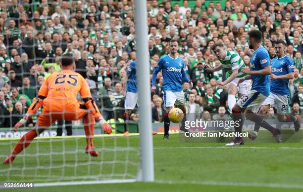 James Forrest of Celtic scores his sides third goal during the Scottish Premier League match between Celtic and Rangers at Celtic Park on April 29,...