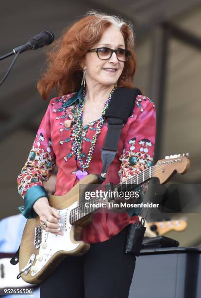 Bonnie Raitt performs during a tribute to Fats Domino at the 2018 New Orleans Jazz & Heritage Festival at Fair Grounds Race Course on April 28, 2018...