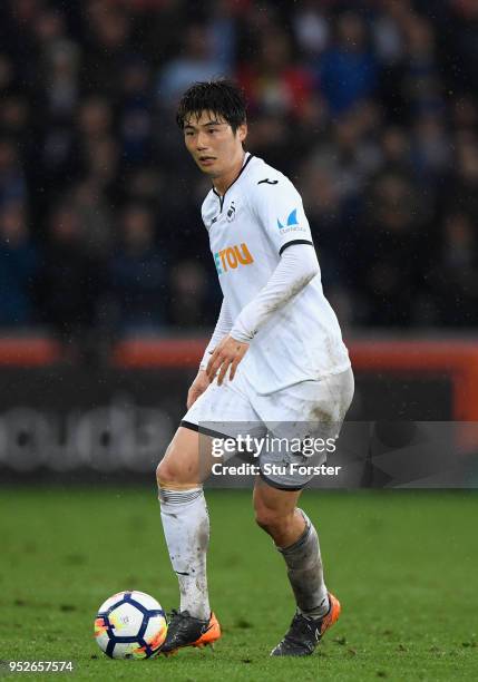 Swansea player Ki Sung-Yeung in action during the Premier League match between Swansea City and Chelsea at Liberty Stadium on April 28, 2018 in...