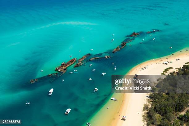 flying high over the tangalooma wrecks queensland - brisbane beach stock pictures, royalty-free photos & images