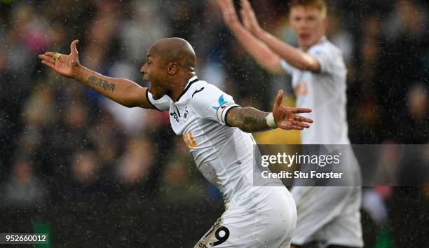 Swansea player Andre Ayew reacts after a chance goes begging during the Premier League match between Swansea City and Chelsea at Liberty Stadium on...