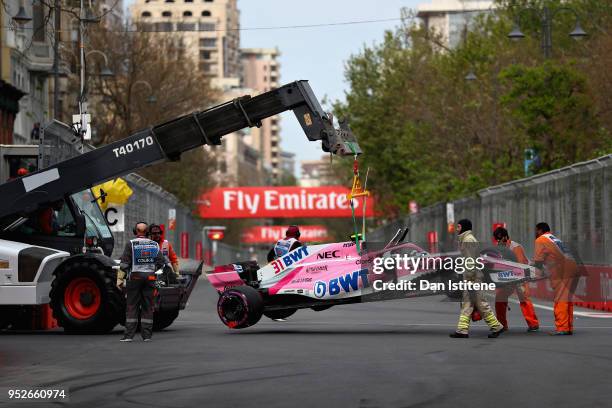 The car of Esteban Ocon of France and Force India is removed from the circuit during the Azerbaijan Formula One Grand Prix at Baku City Circuit on...