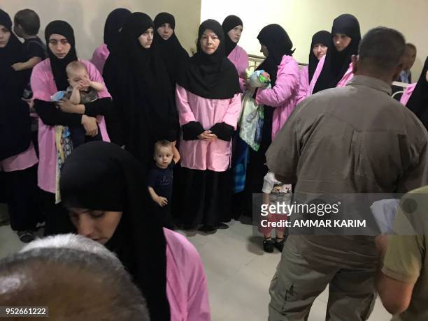 Picture taken on April 29, 2018 in the Iraqi capital Baghdad's Central Criminal Court shows Russian women who have been sentenced to life in prison...