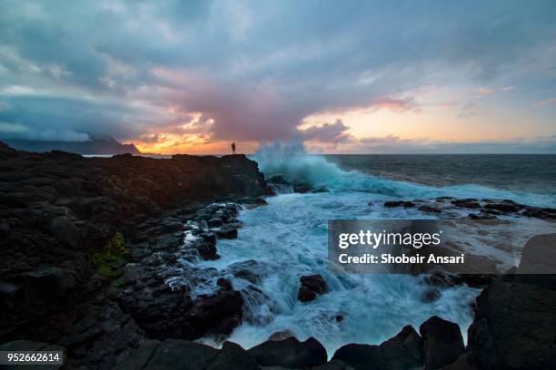 seascape shot at princeville shoreline after storm, kauai, hawaii - princeville stock pictures, royalty-free photos & images