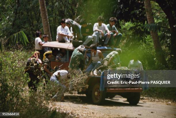 Pirates of the South China Sea And Philippines. Pirates on the attack on land, accosting a jeep serving as local taxi and filled with travellers. On...