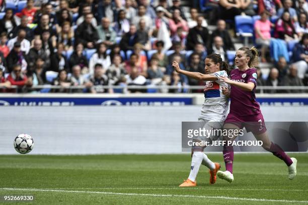 Manchester City's British forward Melissa Lawley vies with Lyon's French midfielder Amel Majri during the UEFA Women's Champions League semi-final...